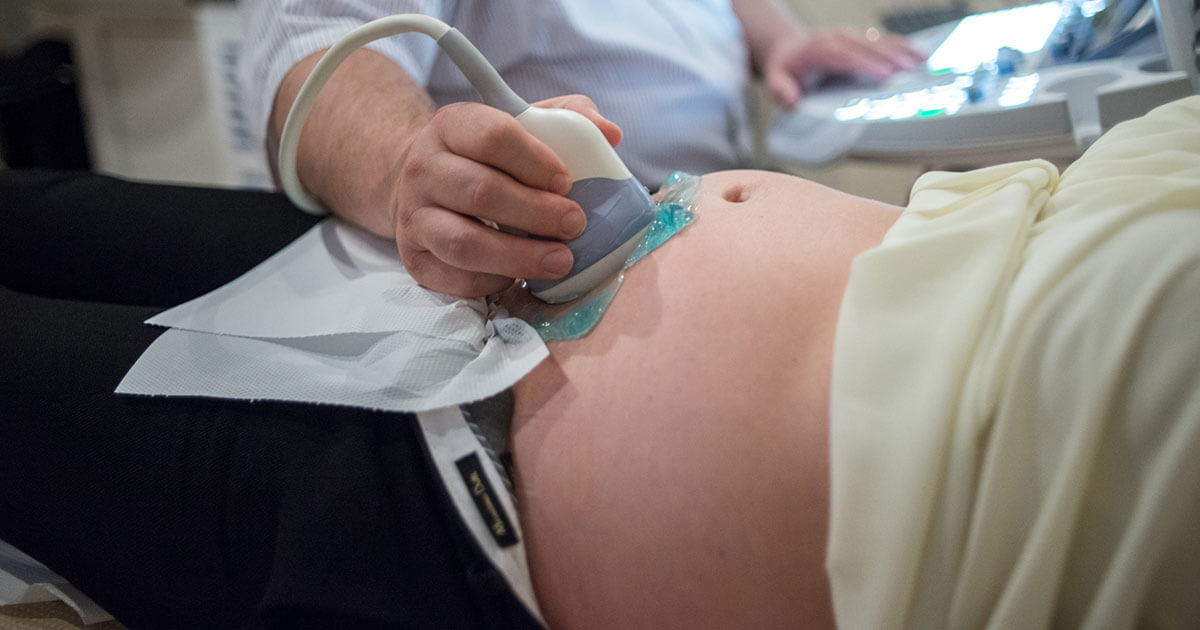 Pregnant patient having an ultrasound